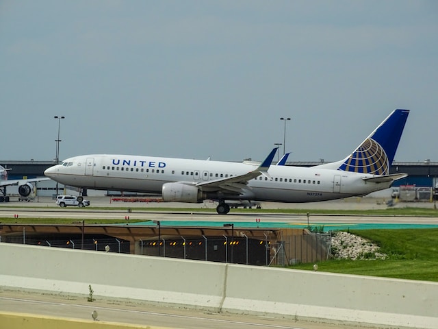A United Airlines plane takes off from an airport